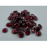 9.58cts round cut Garnets 3mm