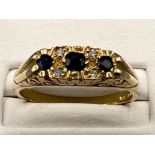 Ladies 9ct gold sapphire and diamond ring. 3.8g size T