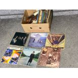 Box of miscellaneous LP records, includes artists Elton John, Rod Stewart & The Rolling Stones etc