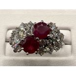 Ladies 18ct white gold diamond and ruby cluster ring. Approx 1.4cts diamonds set with 2 round