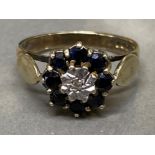 Silver gilt sapphire and diamond cluster ring size N weighing 2.7 grams