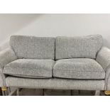 Modern grey two seater sofa