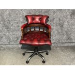 Ox blood red leather captains chair