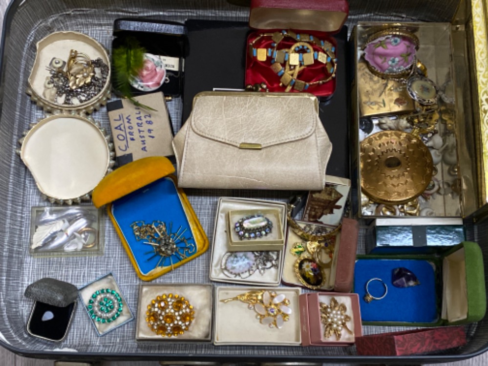 Vintage St.Michael luggage case containing a large amount of miscellaneous costume jewellery