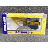 Joal yellow metal Komatsu PC1100LC-6 with material handler, in original box