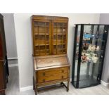 1920s Oak bureau bookcase with double glazed door top & barley twist supports, with key