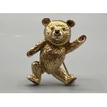 9ct gold Teddy bear pendant brooch set with sapphires for eyes and red stones in each foot. 7.3G