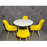 Round white table with 4 stunning lemon yellow chairs