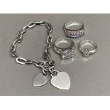 3 silver dress rings & tested silver twin heart Bracelet