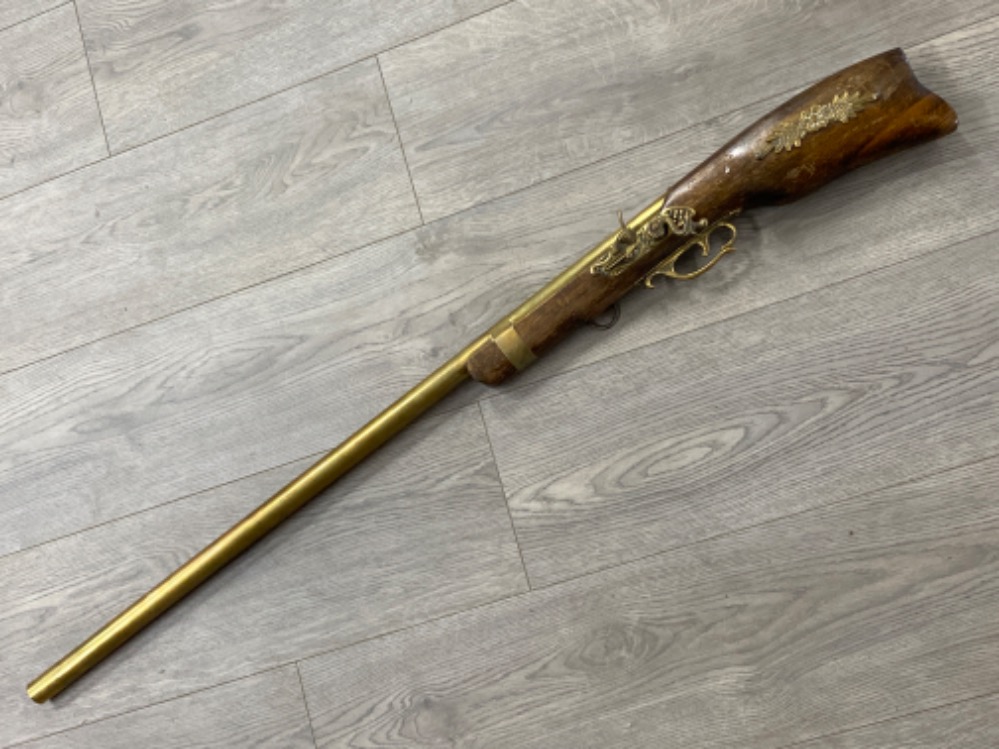 Vintage ornamental brass & wooden flintlock rifle