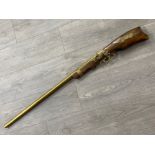 Vintage ornamental brass & wooden flintlock rifle