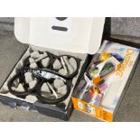 Boxed Parrot AR.Drone 2.0 together with a overdrive car set