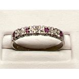 Ladies 9ct white gold Ruby and diamond set ring. Size R (2g)