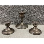 Pair of sterling silver Dwarf candlesticks and a single hallmarked silver candlestick