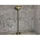 Contemporary pedestal uplighter on brass effect base with glass Tiffany style shade, Height 169cm