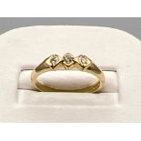 9ct gold ring set with 3 white stones. Size M (2.2g)