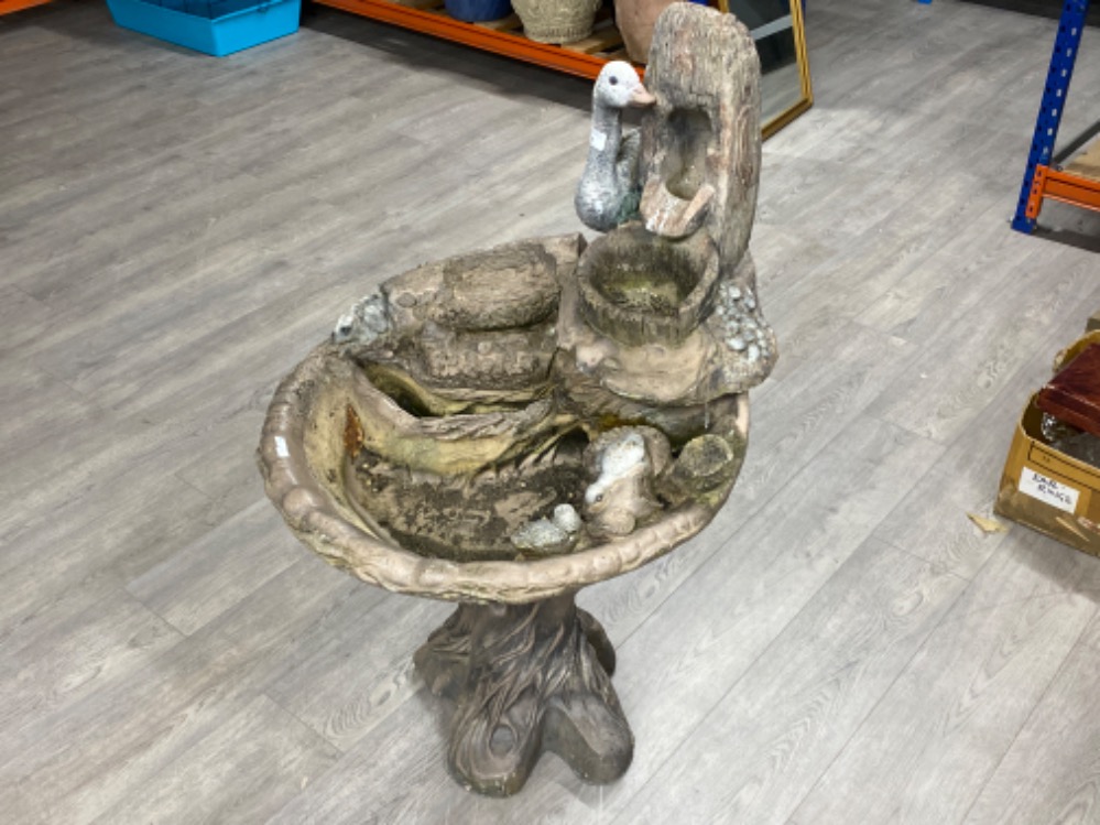 Large nicely decorated concrete water feature (animal/tree trunk design) H104cm x W53cm