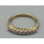 Ladies 14ct yellow gold and cubic zirconia eight stone ring size H 1/2 1.2g gross