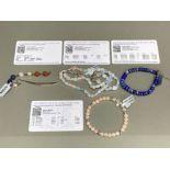 Three gemstone bracelets including Lapis Lazuli and bookmark by Gemporia with COAs