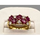 Ladies 9ct gold Ruby and white stone ring. Size M1/2 (3.5g)