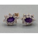 Ladies 9ct yellow gold cubic zirconia and amethyst cluster stud earrings 1g gross