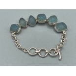 Ladies silver and stone set bracelet with T bar fastener 16g gross