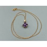 Ladies 9ct yellow gold amethyst and diamond cluster pendant and 9ct yellow gold chain 2.3g gross