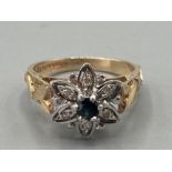 Ladies 9ct yellow gold sapphire and diamond cluster ring of floral design size L 3.6g gross