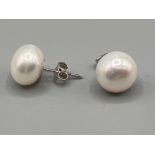 Silver cultured pearl stud earrings