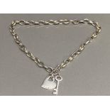 Silver belcher chain with 2 silver pendants (key to my heart) each pendant containing 3x small