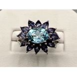 Ladies 9ct white gold blue and purple large fancy cluster ring. Size M (4g)