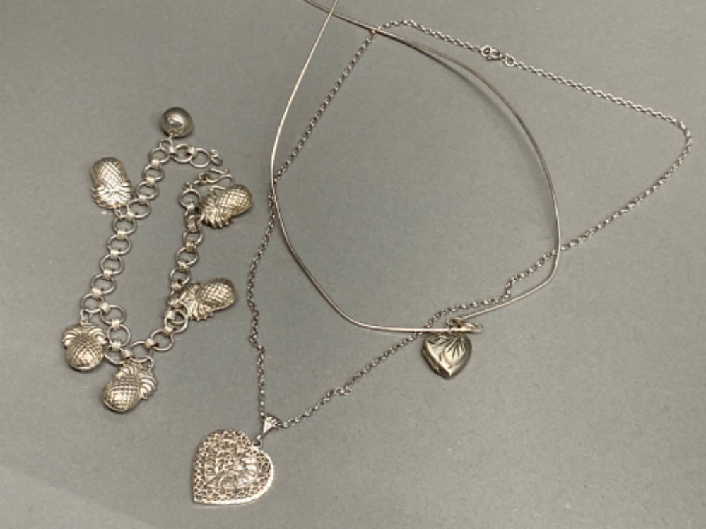 3x silver items includes charm bracelet with pineapple charms & 2x necklaces with heart shape