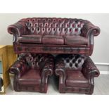 Ox-blood leather & metal studded 3 piece chesterfield suite, comprising of a 3 seater sofa & 2