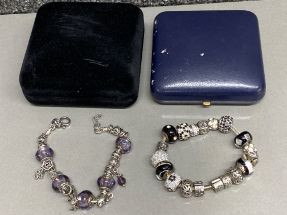 2x silver 925 charm bracelets, with white, purple & black stone charms, 91g gross