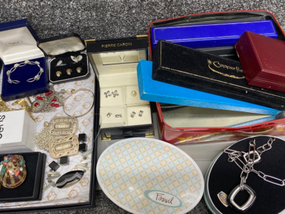 Selection of costume jewellery includes earrings, bangles, cufflinks etc, plus a tin of empty