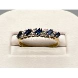 Ladies 9ct gold blue sapphire and white stone ring. Size P (1.7g)