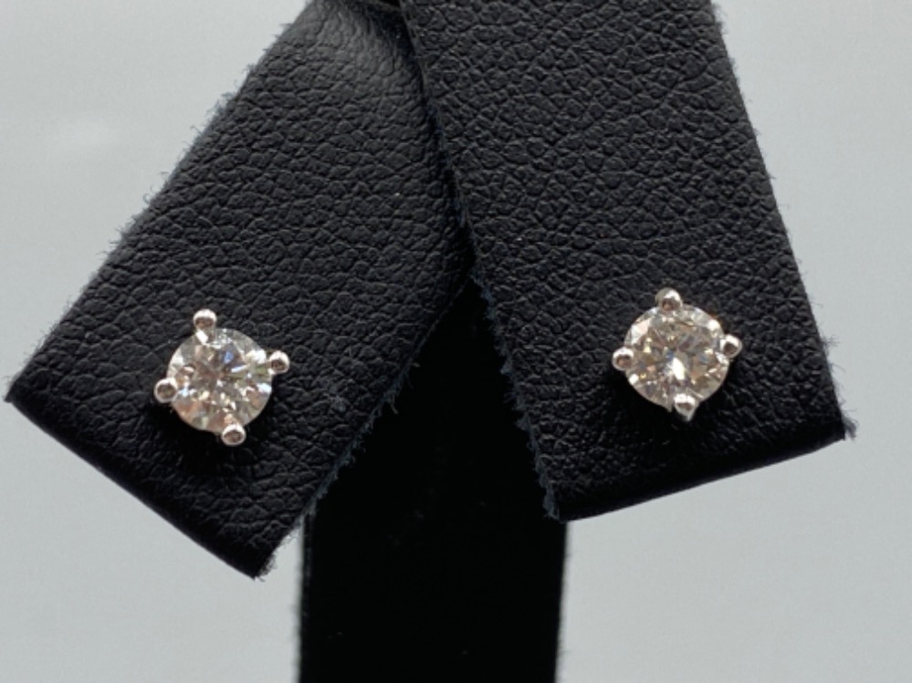 18ct White Gold Diamond Studs 0.60cts total weighing 1.16grams
