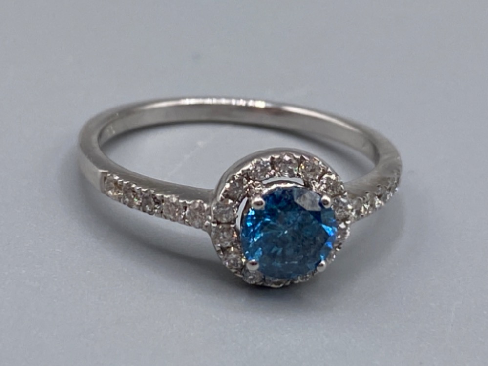 18ct white gold ring comprising of a 0.60ct blue diamond surrounded by a total of 0.30cts of - Image 3 of 3