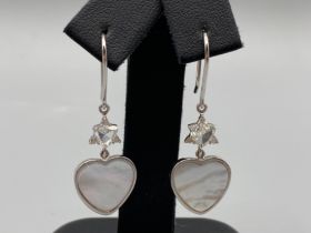18ct White Gold Mother of Pear Heart Shaped Earrings Comprising of 0.7cts total of diamonds