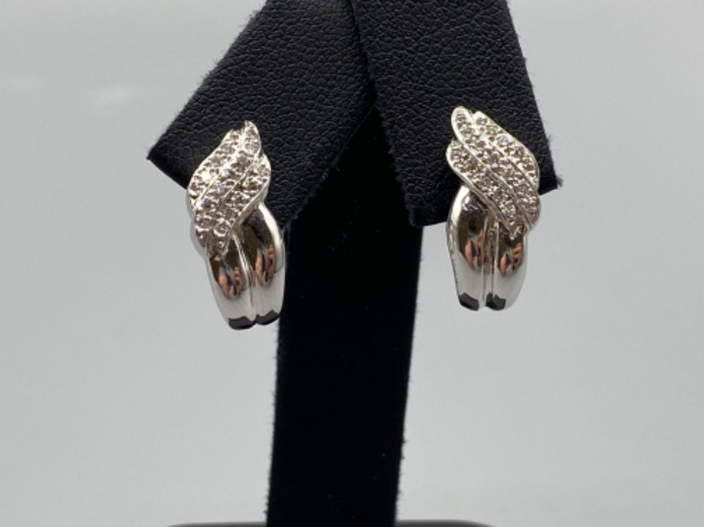 18ct White Gold Fancy Cuff style earrings comprising of 0.30cts of diamonds weighing 7.37 grams