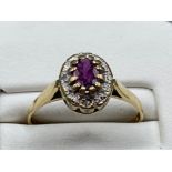 Vintage ladies 9ct gold Ruby and diamond cluster ring. Size N (2.2g)