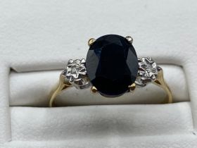 Brand new ex display ladies 9ct gold sapphire and diamond 3 stone ring. Size O (1.8g)