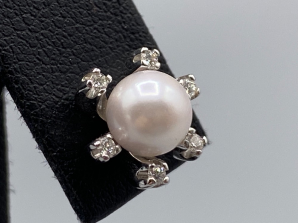 Beautiful Pearl Studs each surrounded by 6 small diamonds - 0.10cts total weighing 4.36 grams - Image 3 of 3
