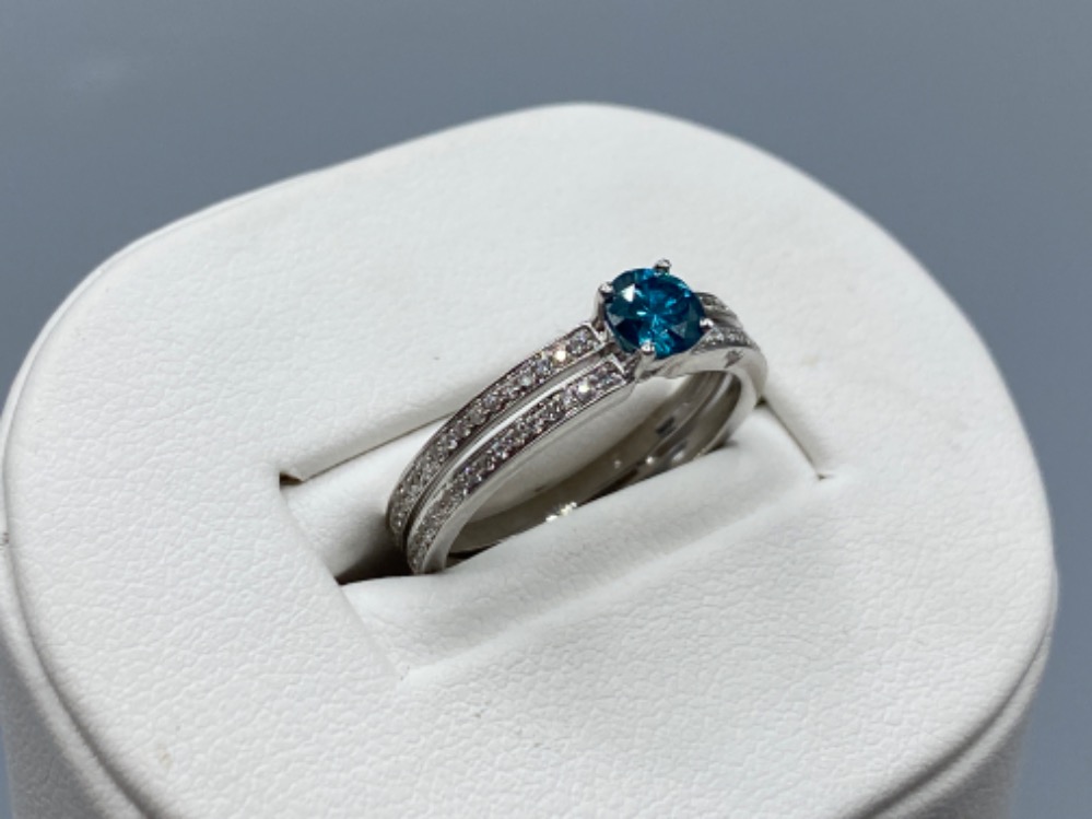 18ct White Gold Double Banded Ring with a 0.41ct coloured diamond centre stone surrounded by a total - Image 2 of 3