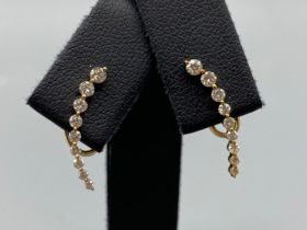 Stunning Ladies Drop Diamond Design Earrings Comprising of a total of 0.52ct of Diamonds weighing