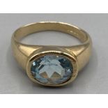 9ct yellow gold and blue stone ring size O 4.2g gross