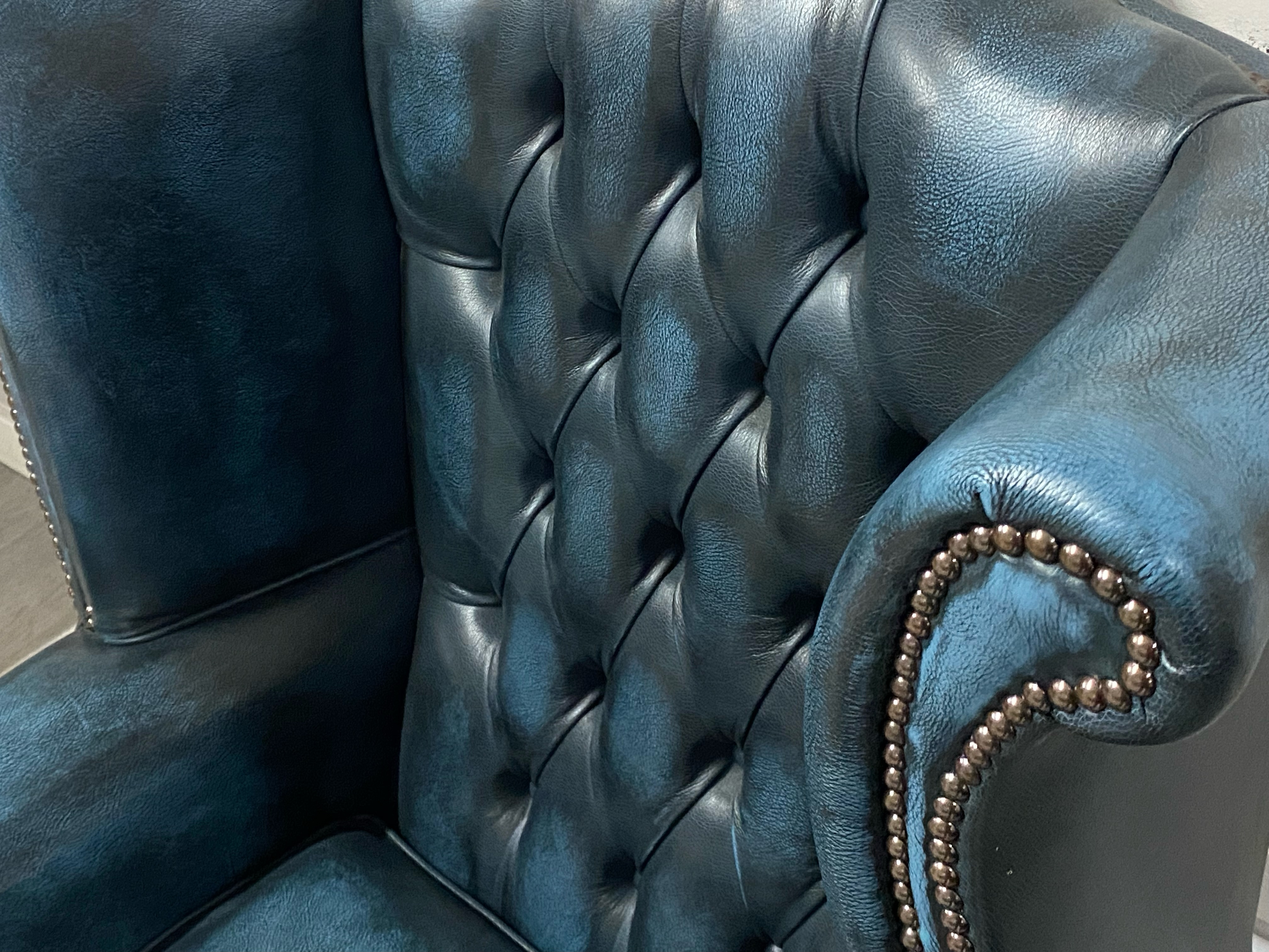 A large four seater blue leather chesterfield upholstered in blue leather, and a matching wingback - Image 5 of 5