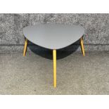 Triangular grey coffee table