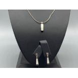 Silver mother of pearl pendant and earrings