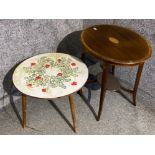 Oval shaped inlaid mahogany table together with a 1970s occasional table with flower decoration to